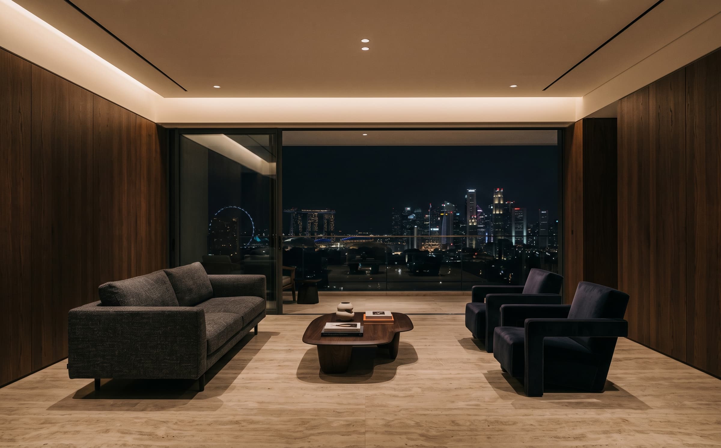 A nighttime interior of the Skyline Residence looking toward the Singapore skyline