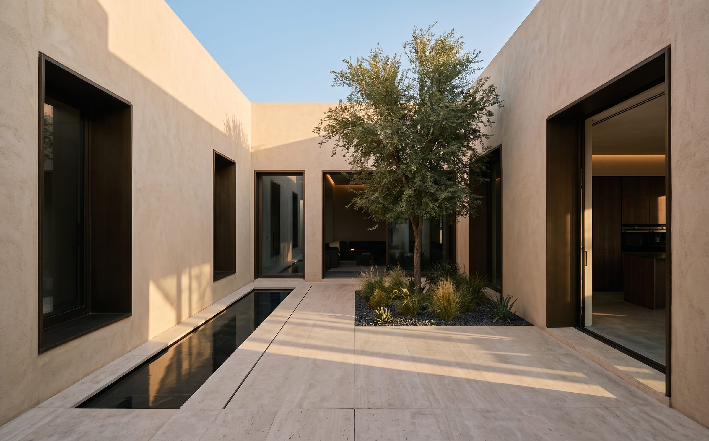 Dune House in Dubai at blue hour — a contemporary residence organised around a shaded courtyard
